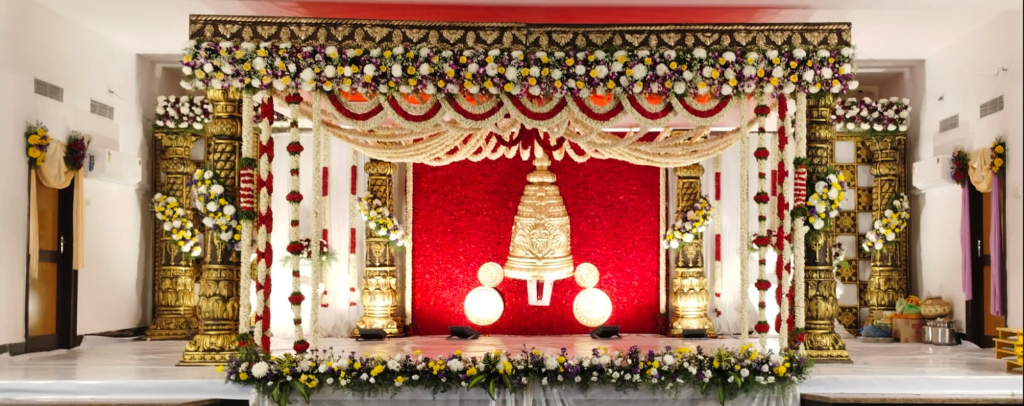 Royal Kalyana Mandapam with Red Rose Velvet & Golden Kalasam Backdrop
